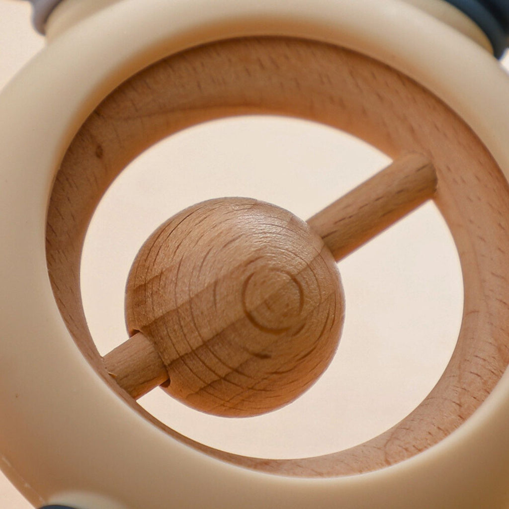 Baby silicone teether color blue with wooden ring and rattle