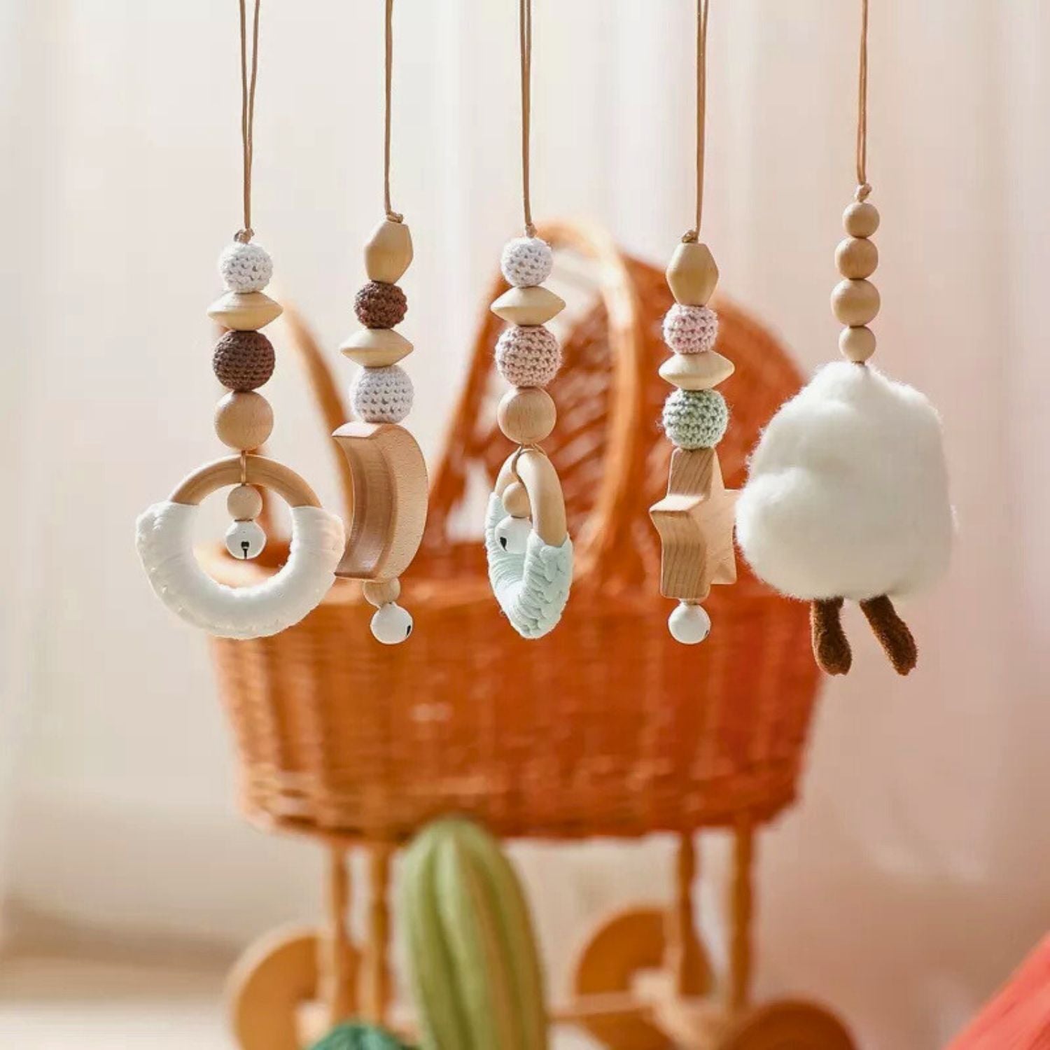 Wooden and wool baby hanging toys with ruttle